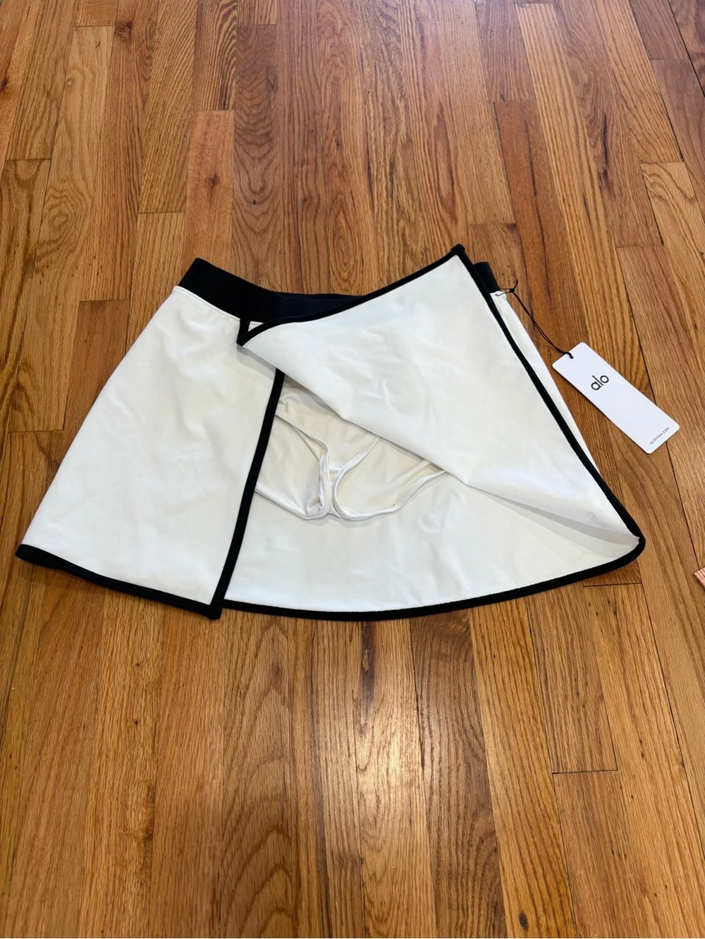 Alo white Crop Bustier Top with Black Trim with matching skirt